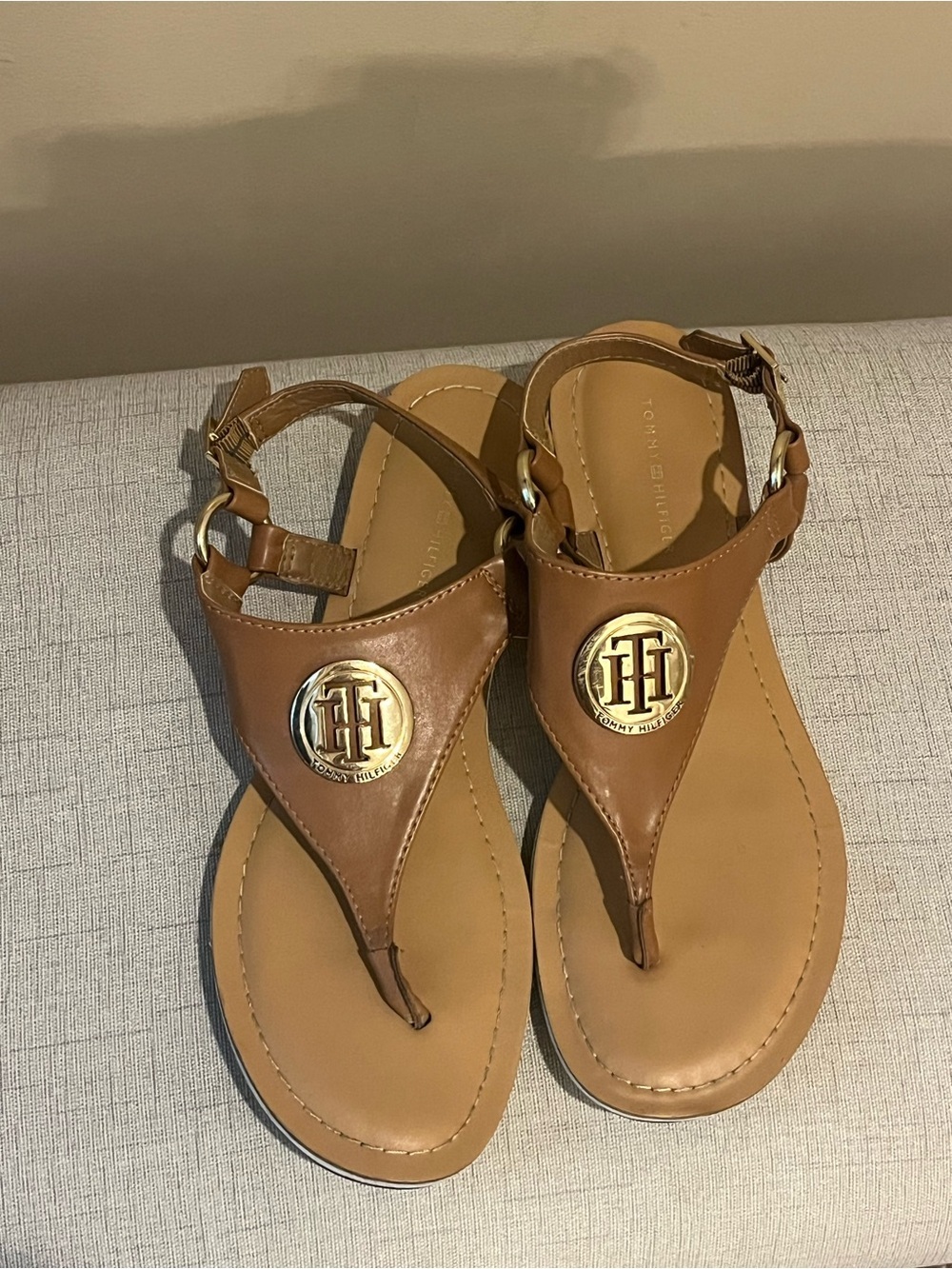 Tommy Hilfiger Tan Leather T-Strap Sandals with Gold Medallions